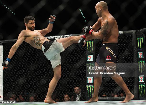 Carlos Condit kicks Robbie Lawler in their welterweight championship fight during the UFC 195 event inside MGM Grand Garden Arena on January 2, 2016...