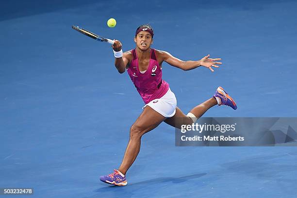 Teliana Pereira of Brazil plays a forehand against Andrea Petkovic of Germany during day one of the 2016 Brisbane International at Pat Rafter Arena...