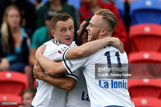 Besart Berisha and Connor Pain of the Victory celebrate a goal during the round 13 A-League match between the Newcastle Jets and Melbourne Victory at...