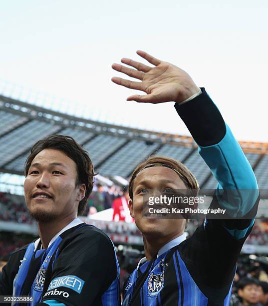 Takashi Usami of Gamba Osaka waves to supporters after winning the 95th Emperor's Cup final between Urawa Red Diamonds and Gamba Osaka at Ajinomoto...