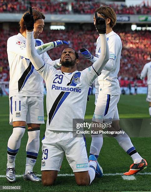 Patric of Gamba Osaka celebrates scoring his team's second goal with his team mates during the 95th Emperor's Cup final between Urawa Red Diamonds...