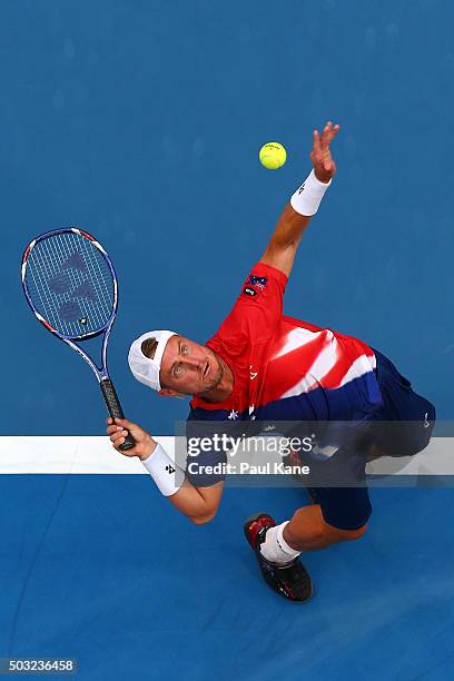 Lleyton Hewitt of Australia Gold serves to Jiri Vesely of the Czech Republic during day one of the 2016 Hopman Cup at Perth Arena on January 3, 2016...