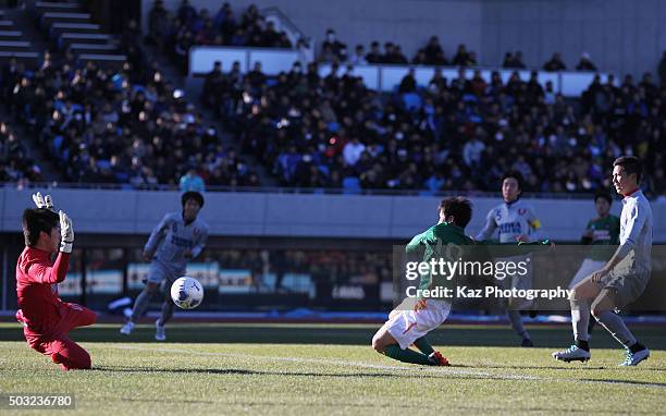 Riku Saga of Aomori Yamada scores his team's second goal during the 94th All Japan High School Soccer Tournament second round match between Aomori...