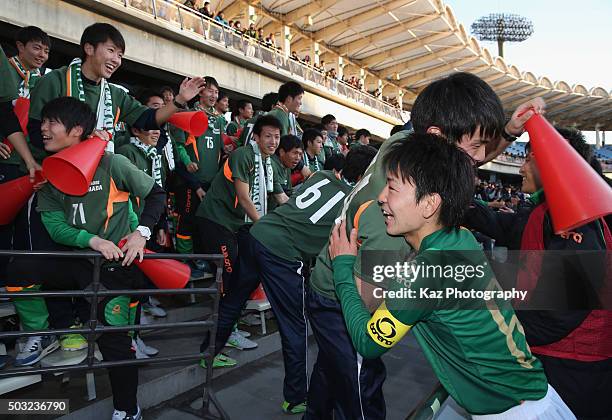 Captain Toshiyuki Kitajo of Aomori Yamada celebrates with his team mates after his team's 5-0 win in the 94th All Japan High School Soccer Tournament...