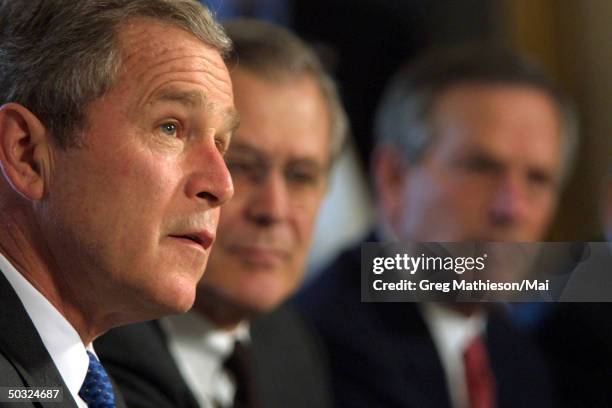 President George W. Bush holding a cabinet meeting in the Cabinet Room in the West Wing of the White House. The President answered reporters...