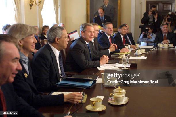 President George W. Bush holding a cabinet meeting in the Cabinet Room in the West Wing of the White House. The President answered reporters...