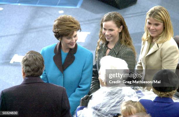 First Lady Laura Bush w. Daughters Barbara and Jenna at Inaugural ceremonies on the west side of the US Capitol building.