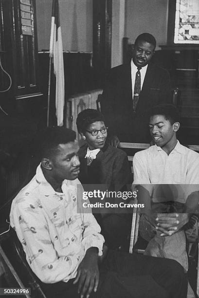 Civil rights leader Ralph Abernathy watching African Americans taking part in excercise to demonstrate how to show goodwill to whites on newly...
