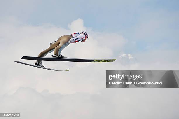 Severin Freund of Germany soars through the air during his trial jump on Day 2 of the Innsbruck 64th Four Hills Tournament ski jumping event on...