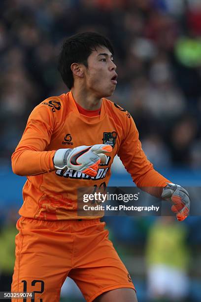 Riku Hirosue of Aomori Yamada celebrates saving a penalty shootout during the 94th All Japan High School Soccer Tournament third round match between...