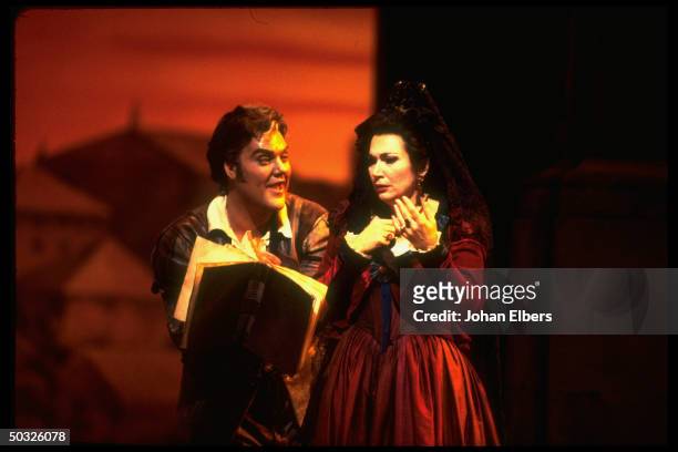 Baritone Bryn Terfel as Leporello singing the famous Catalogue aria w. Soprano Carol Vaness as Donna Anna in Mozart's Don Giovanni on stage at the...