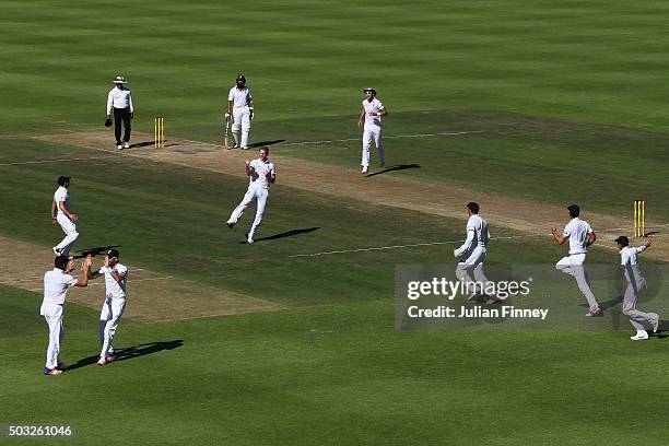 Ben Stokes of England celebrates taking the wicket of Dean Elgar of South Africa caught out by Nick Compton of England during day two of the 2nd Test...