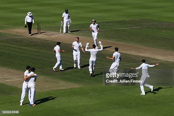 Ben Stokes of England celebrates taking the wicket of Dean Elgar of South Africa caught out by Nick Compton of England during day two of the 2nd Test...