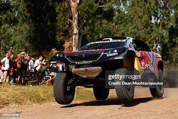 Sebastien Loeb of France and Daniel Elena of Monaco in the PEUGEOT 2008 DKR for TEAM PEUGEOT TOTAL compete in the Dakar Rally Prologue on January 2,...