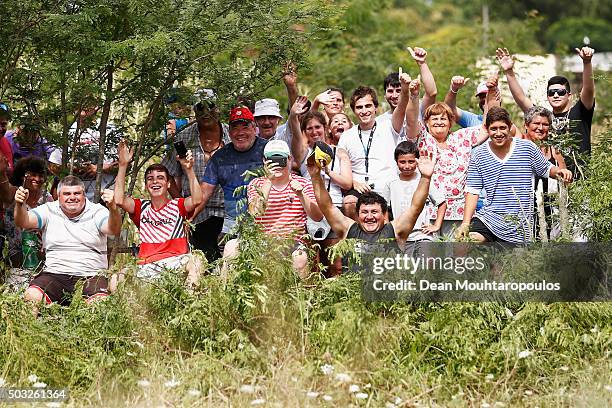 Fans watch the action during the Dakar Rally Prologue on January 2, 2016 outside Buenos Aires near Ariecifes, Argentina.