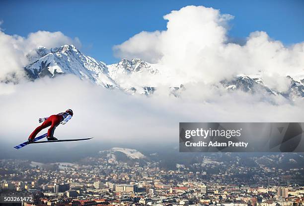 Andreas Wank of Germany soars through the air during his first competition jump on day 2 of the Innsbruck 64th Four Hills Tournament on January 3,...