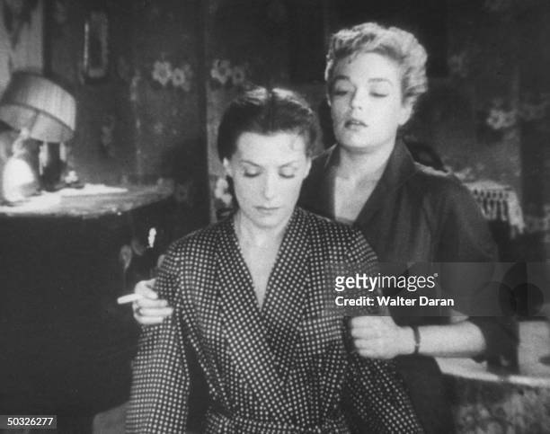 Actresses Simone Signoret and Vera Clouzot acting in a scene from the movie Diabolique.