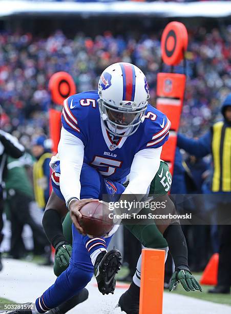 Tyrod Taylor of the Buffalo Bills gets the ball inside the touchdown marker before he is hit out of bounds for the score against the New York Jets...