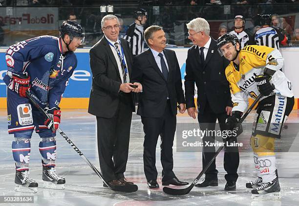 Captain Eric Chouinard of Grenoble , FFHG president Luc Tardif, IIHF president Rene Fasel, DEB president Franz Reindel and Captain Patrick Coulombe...