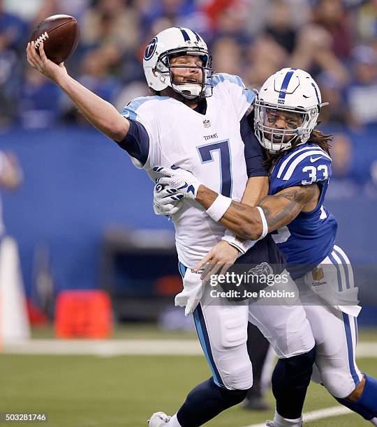 Dwight Lowery of the Indianapolis Colts hits Zach Mettenberger of the Tennessee Titans at Lucas Oil Stadium on January 3, 2016 in Indianapolis,...