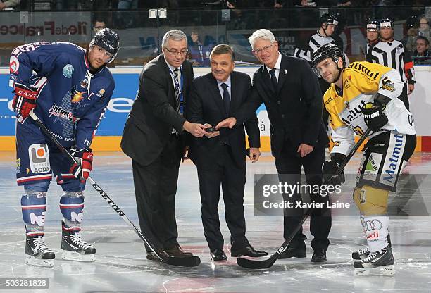 Captain Eric Chouinard of Grenoble , FFHG president Luc Tardif, IIHF president Rene Fasel, DEB president Franz Reindel and Captain Patrick Coulombe...