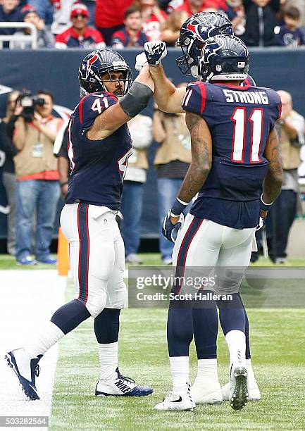 Jonathan Grimes of the Houston Texans is congratulated for his 3 yard touchdown run against the Jacksonville Jaguars in the second quarter on January...