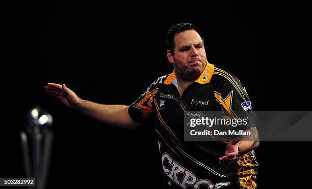 Adrian Lewis of England celebrates winning the second set against Gary Anderson of Scotland in the final match during Day Fifteen of the 2016 William...