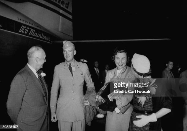 Major, John Eisenhower, President's son, with his wife, meeting his mother and father, Dwight D. Eisenhower and Mamie, in Colorado.