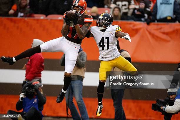 Terrelle Pryor of the Cleveland Browns makes a catch in front of Antwon Blake of the Pittsburgh Steelers during the second quarter at FirstEnergy...