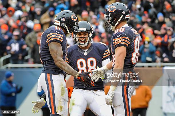 Rob Housler of the Chicago Bears celebrates with Josh Bellamy after Bellamy makes a touchdown reception in the third quarter at Soldier Field on...