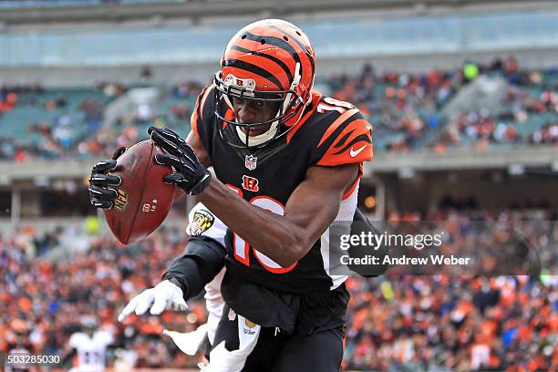 Wide receiver A.J. Green of the Cincinnati Bengals catches a pass for a touchdown while being defended by defensive back Shareece Wright of the...