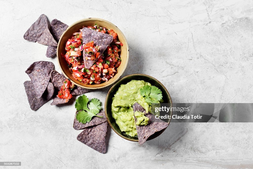 Corn chips with salsa and guacamole