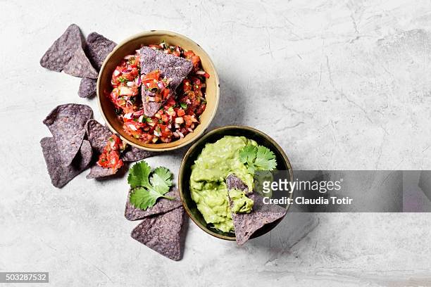 corn chips with salsa and guacamole - tortilla chip stock pictures, royalty-free photos & images