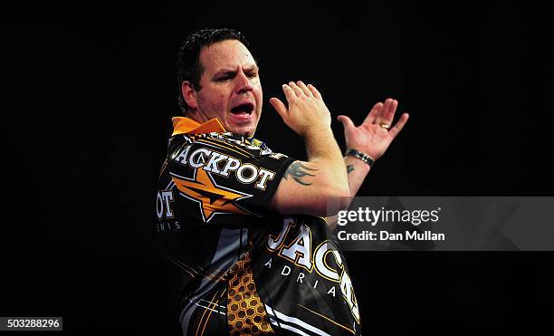 Adrian Lewis of England reacts during the final match against Gary Anderson of Scotland on Day Fifteen of the 2016 William Hill PDC World Darts...