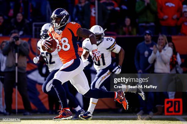 Wide receiver Demaryius Thomas of the Denver Broncos runs clear of the San Diego Chargers defense for a 72-yard first quarter touchdown reception...