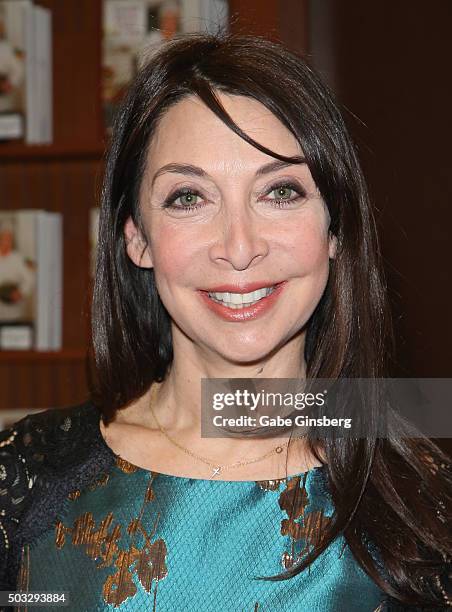 Actress Illeana Douglas poses with her new book "I Blame Dennis Hopper: And Other Stories from a Life Lived in and Out of the Movies" at a Barnes &...