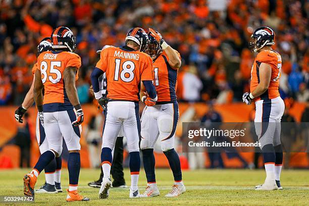Quarterback Peyton Manning of the Denver Broncos celebrates with Owen Daniels after the Denver Broncos went ahead 27-20 over the San Diego Chargers...