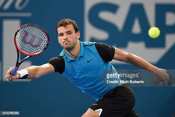 Grigor Dimitrov of Bulgaria plays a forehand against Gilles Simon of France during day two of the 2016 Brisbane International at Pat Rafter Arena on...