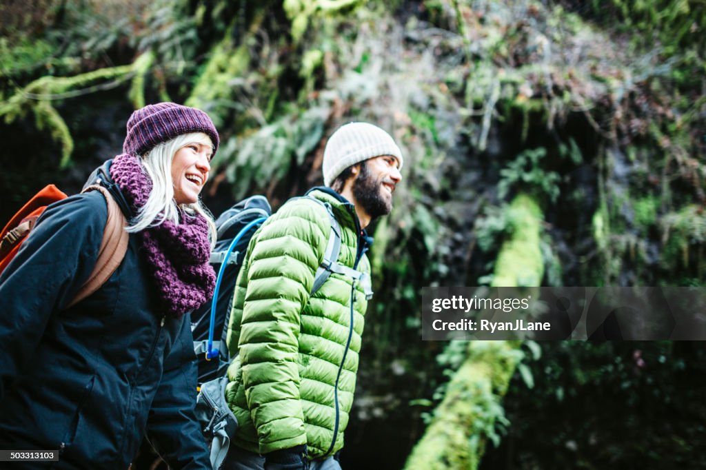Couple Hiking in Forest Gorge