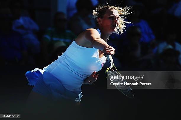 Sacha Jones of Australia serves during her first round doubles match with Rosie Cheng of New Zealand against Marina Erakovic of New Zealand and...