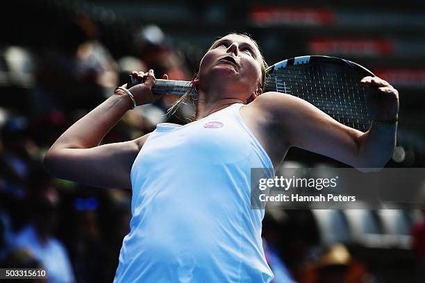 Sacha Jones of Australia serves during her first round doubles match with Rosie Cheng of New Zealand against Marina Erakovic of New Zealand and...