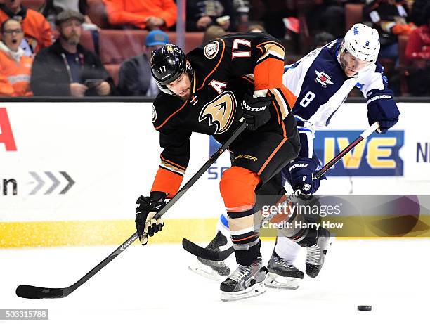 Ryan Kesler of the Anaheim Ducks puts a move on Jacob Trouba of the Winnipeg Jets during the first period at Honda Center on January 3, 2016 in...