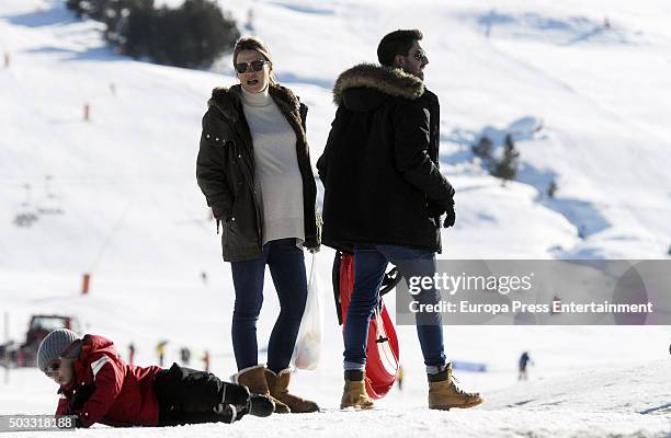 Part of this image has been pixellated to obscure the identity of the child). Alex Ubago, Maria Alcorta and their son Pablo Ubago are seen on...