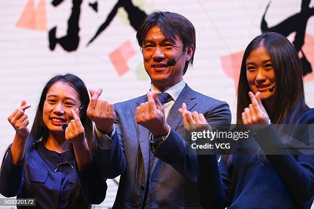 South Korean football coach Hong Myung-Bo gestures during a press conference to announce his move to Hangzhou Greentown Football Club on January 4,...