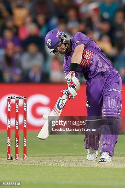 Dan Christian of the Hobart Hurricanes hits a 6 off the bowling of Nathan Rimmington of the Melbourne Renegades during the Big Bash League match...