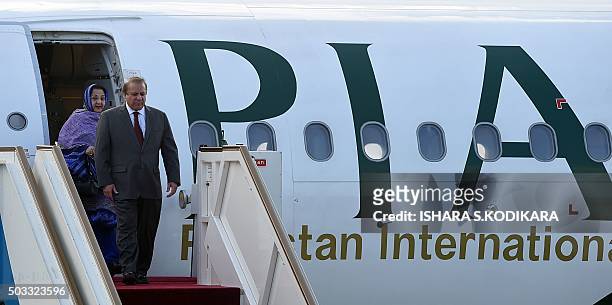 Pakistani Prime Minister Nawaz Sharif and his wife Kalsoom Nawaz Sharif arrive at Bandaranaike International Airport in Katunayake on January 4,...
