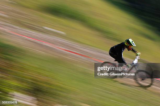 downhill mountain bike racer - sheer stock pictures, royalty-free photos & images