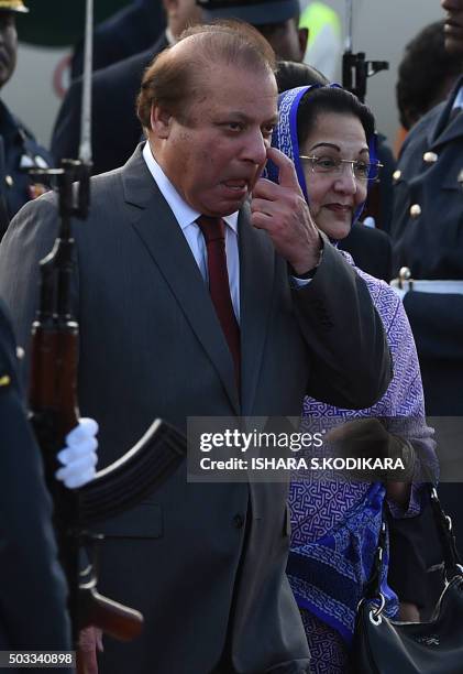 Pakistani Prime Minister Nawaz Sharif and his wife Kalsoom Nawaz Sharif arrive at Bandaranaike International Airport in Katunayake on January 4,...