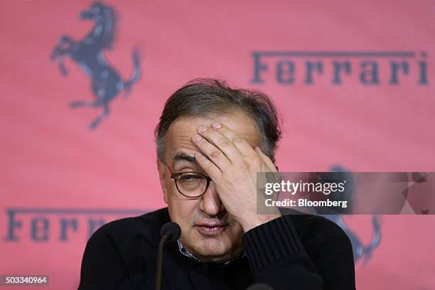 Sergio Marchionne, chief executive officer of Fiat Chrysler Automobiles NV, reacts during a news conference after the Ferrari SpA launch ceremony on...