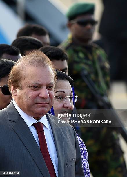 Pakistani Prime Minister Nawaz Sharif and his wife Kalsoom Nawaz Sharif arrive at Bandaranaike International Airport in Katunayake on January 4,...